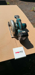 CutMate™ timber support clip attached to a board as a circular saw begins the cut